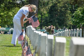 Gold Star Mother Sarah Taylor helped in the placing of flags at the headstone of our fallen heroes.